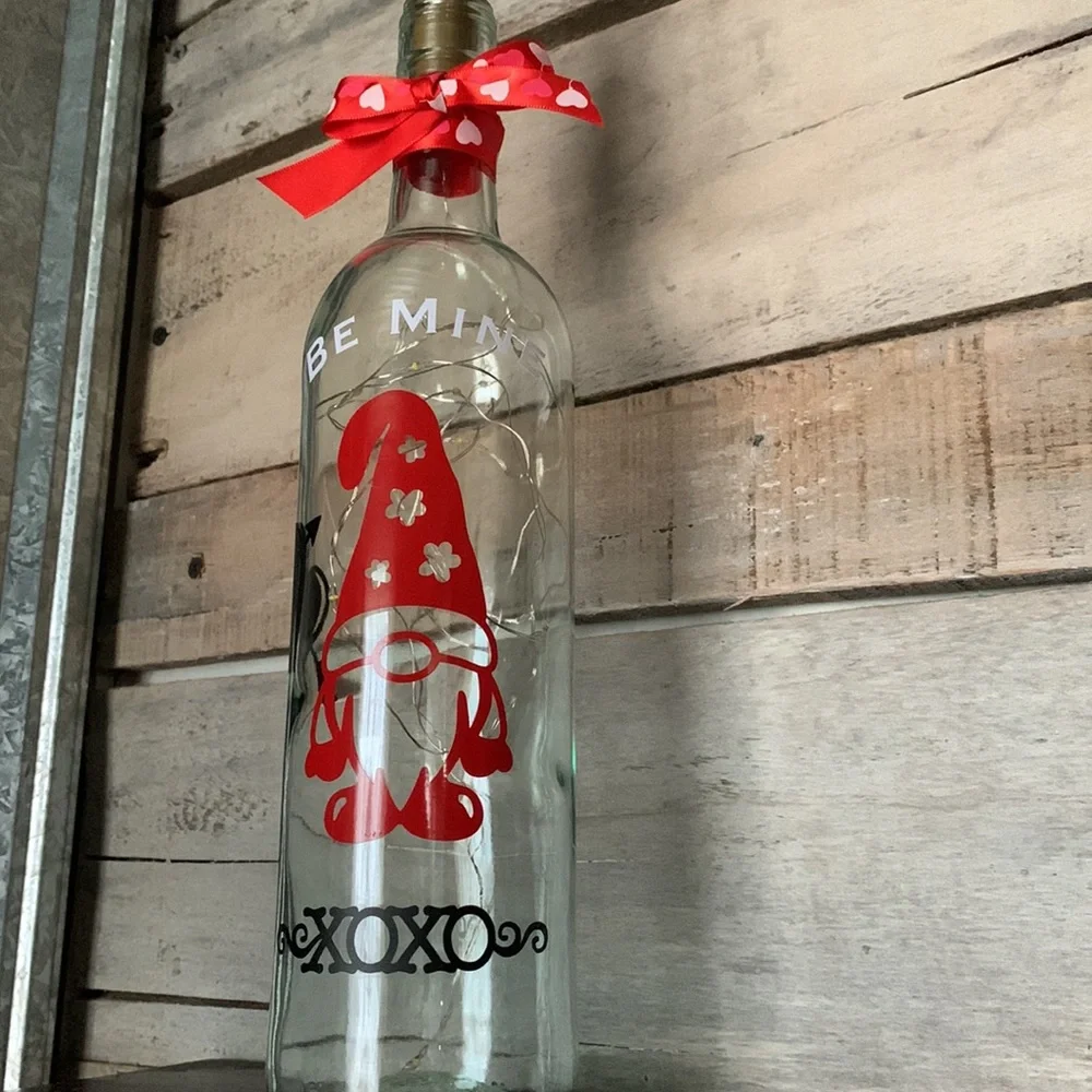 Red Valentine Gnome with black XOXO logo and heart